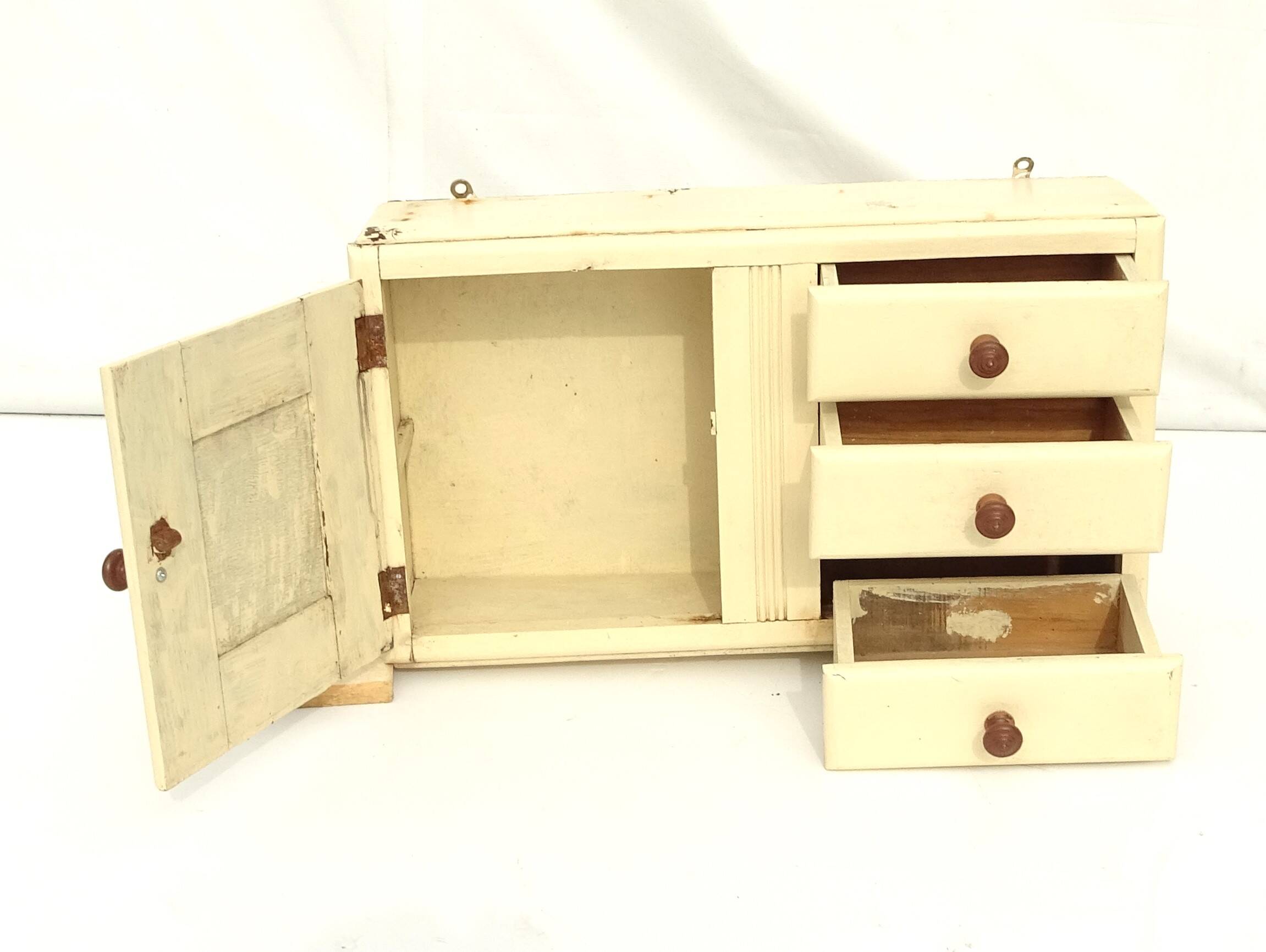 Small vintage wooden wall cupboard.
