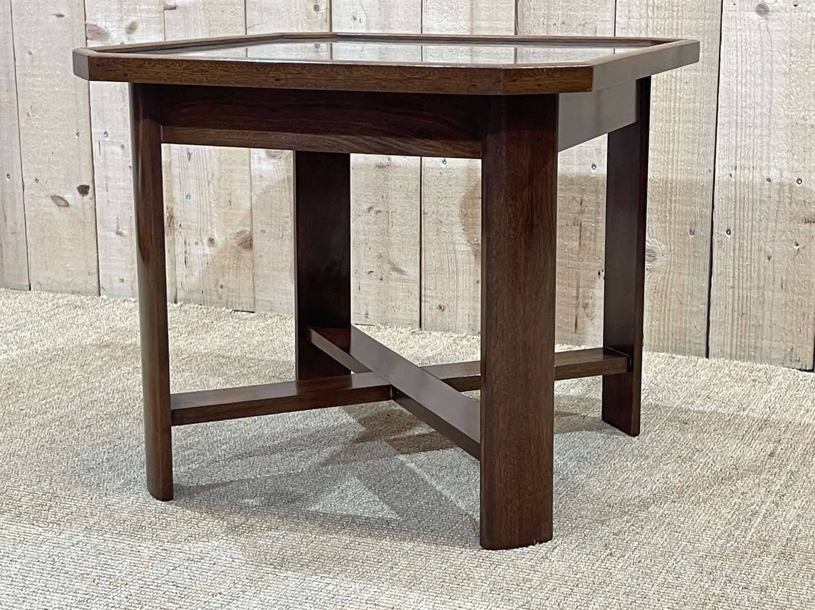 Art Deco side table in mahogany, fabric and glass.
