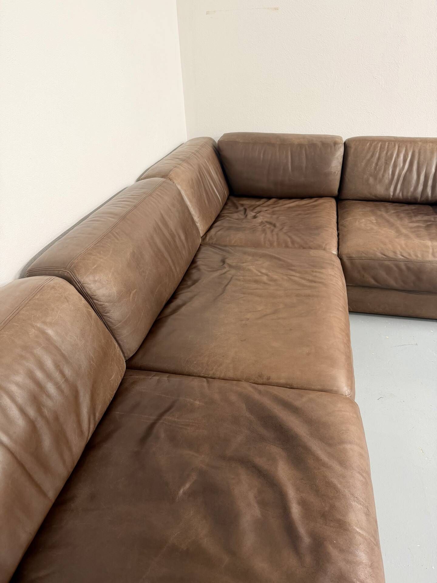 Modular corner sofa DS-76 in brown leather, designed by De Sede, 1980s.