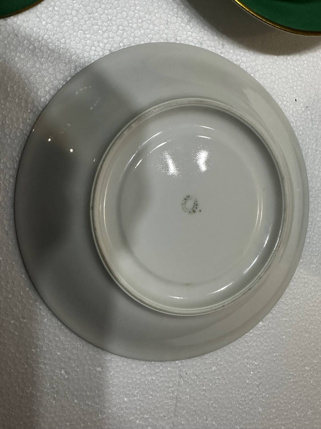 Service 14 cup and saucer in Art Deco Emerald Green and Gold.