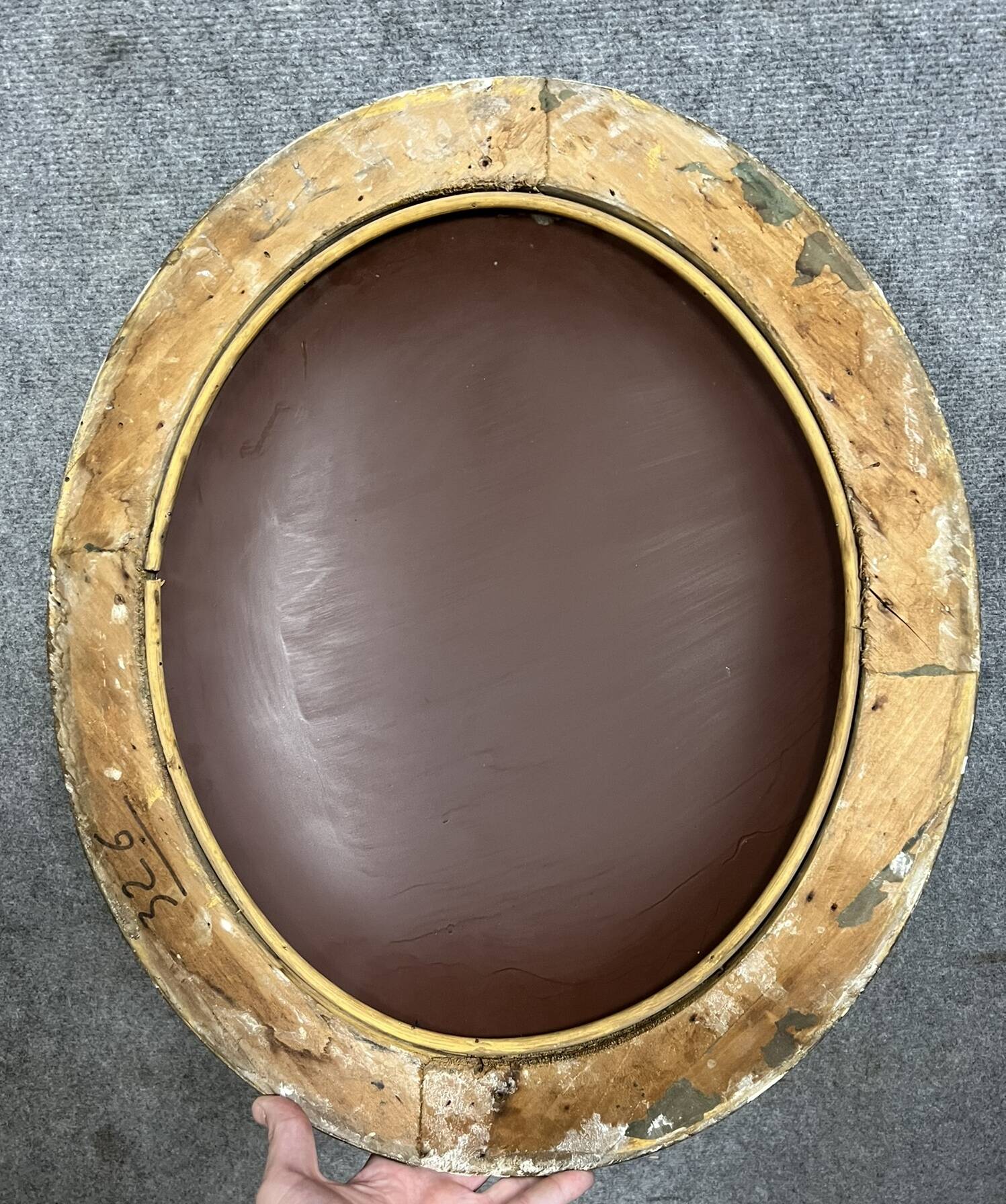 Oval mirror called “witch’s eye” in gilded wood in Louis XVI style circa 1850