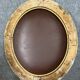 Oval mirror called “witch’s eye” in gilded wood in Louis XVI style circa 1850