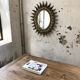 Miroir doré soleil fleuri ancien