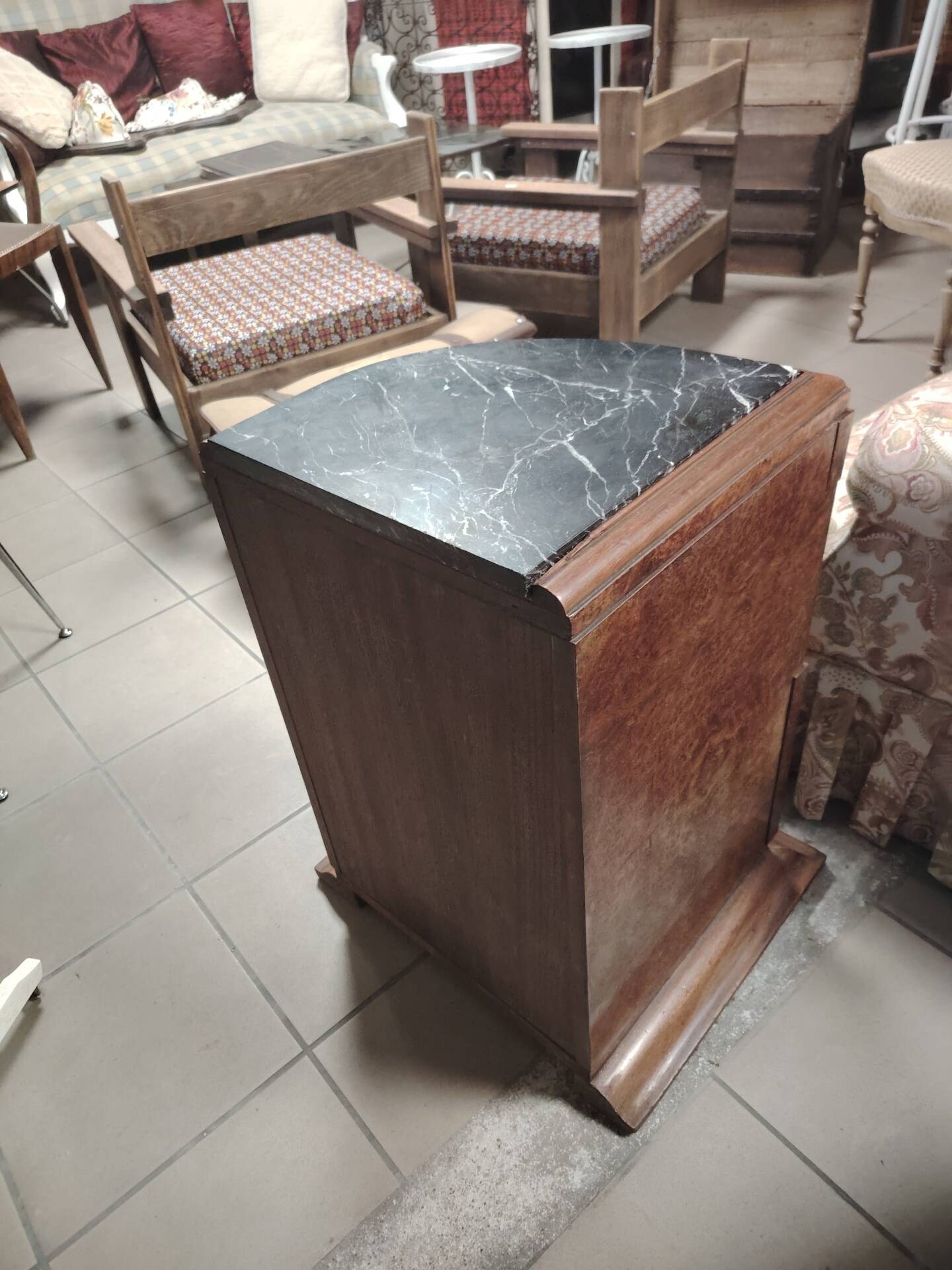 Pair of Art Deco half-moon bedside tables in walnut veneer and black marble.