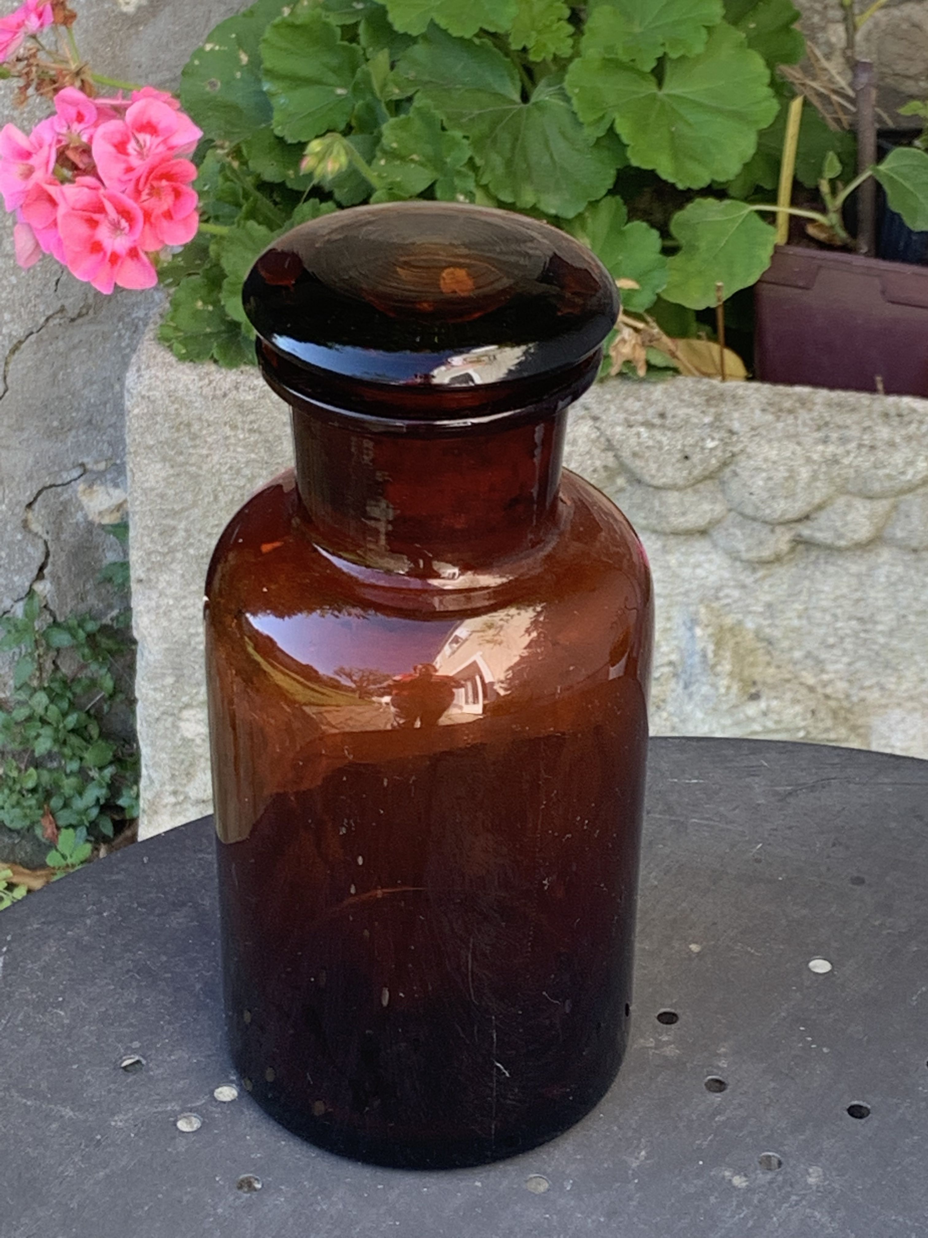 Jar bottle of herbalism pharmacy in amber colored glass art deco