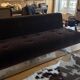 Red Edition Stanley 3-seater sofa with matching chocolate velvet storage.