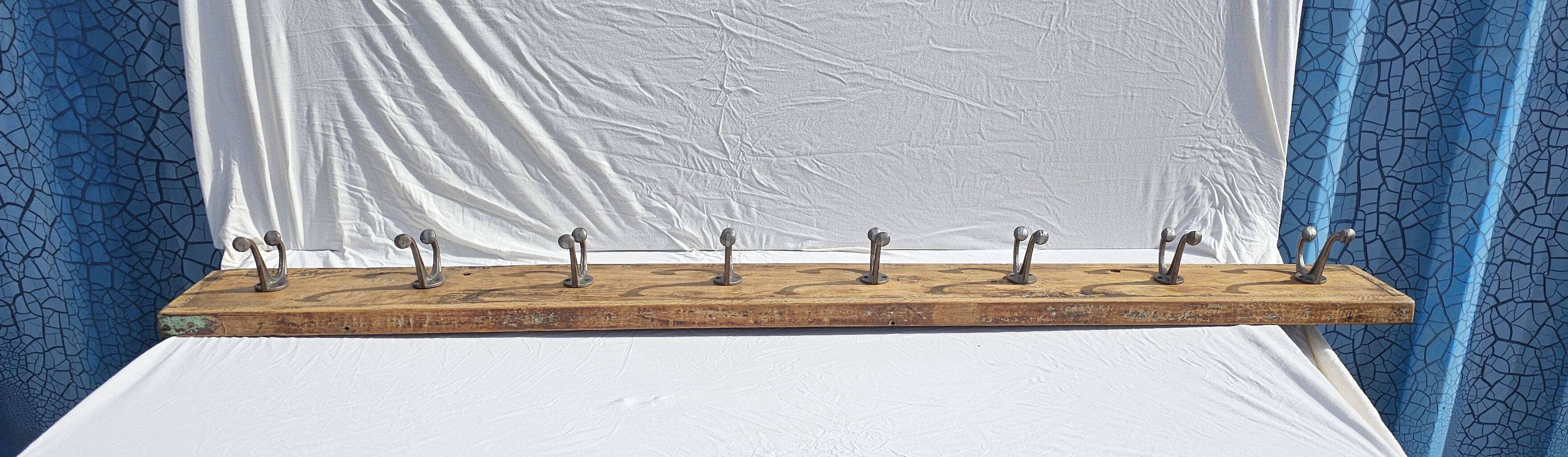 Teak coat rack with 8 double cast iron hooks