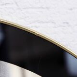 Black and gold 60s round mirror