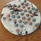 Ceramic solitaire game
