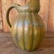 Old ceramic jug in the shape of a gourd by Louis Lourioux