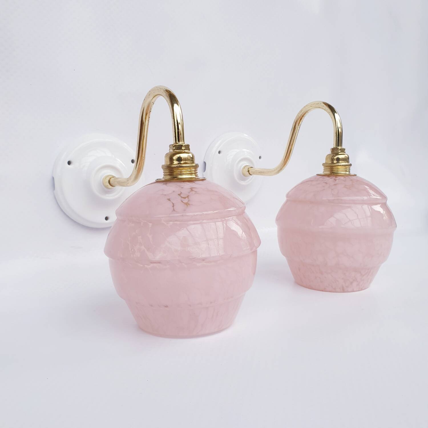 pair of vintage speckled pink and brass wall lights