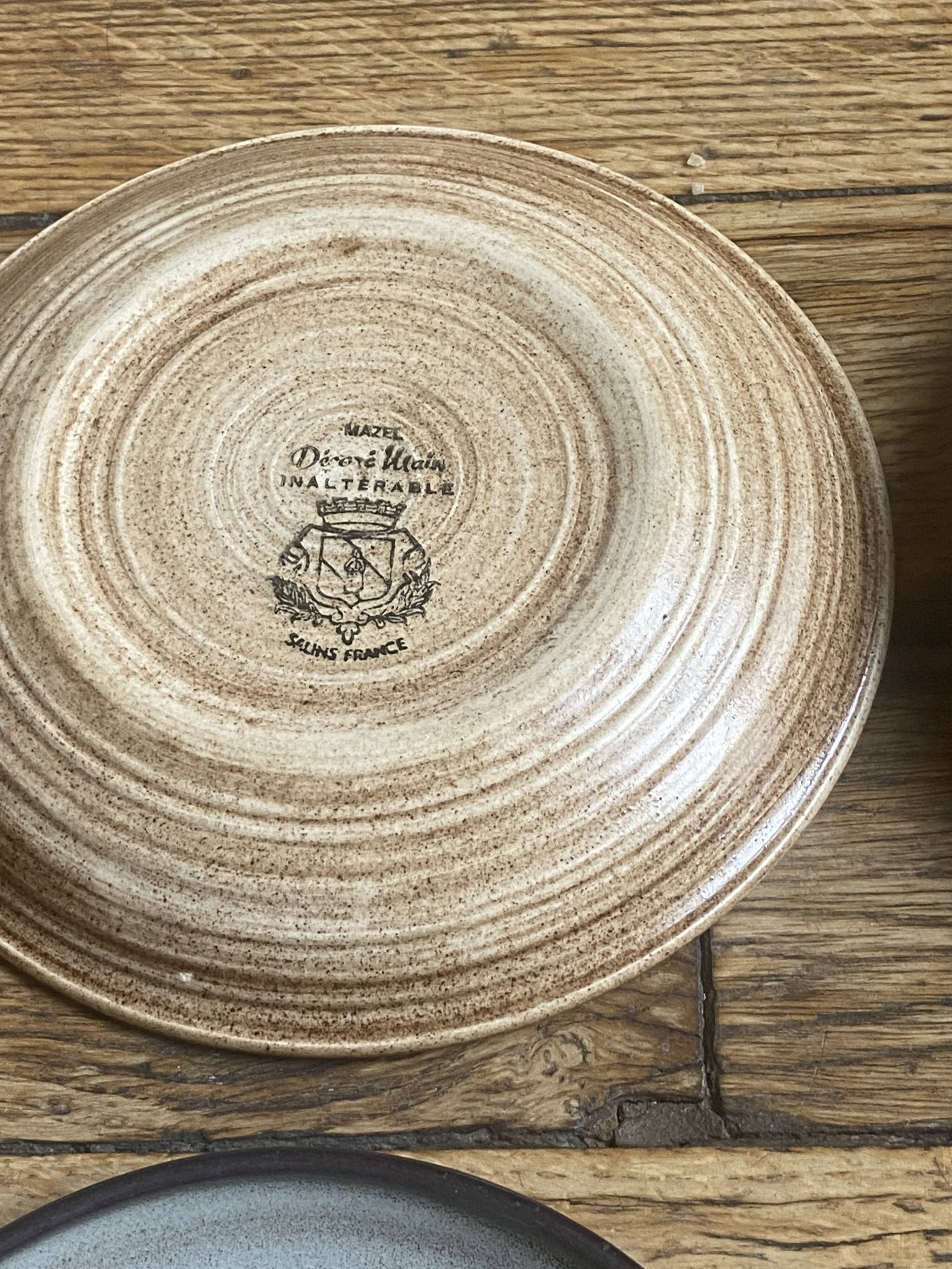 4 flower plates from Salins and Niderviller from the 1970s.