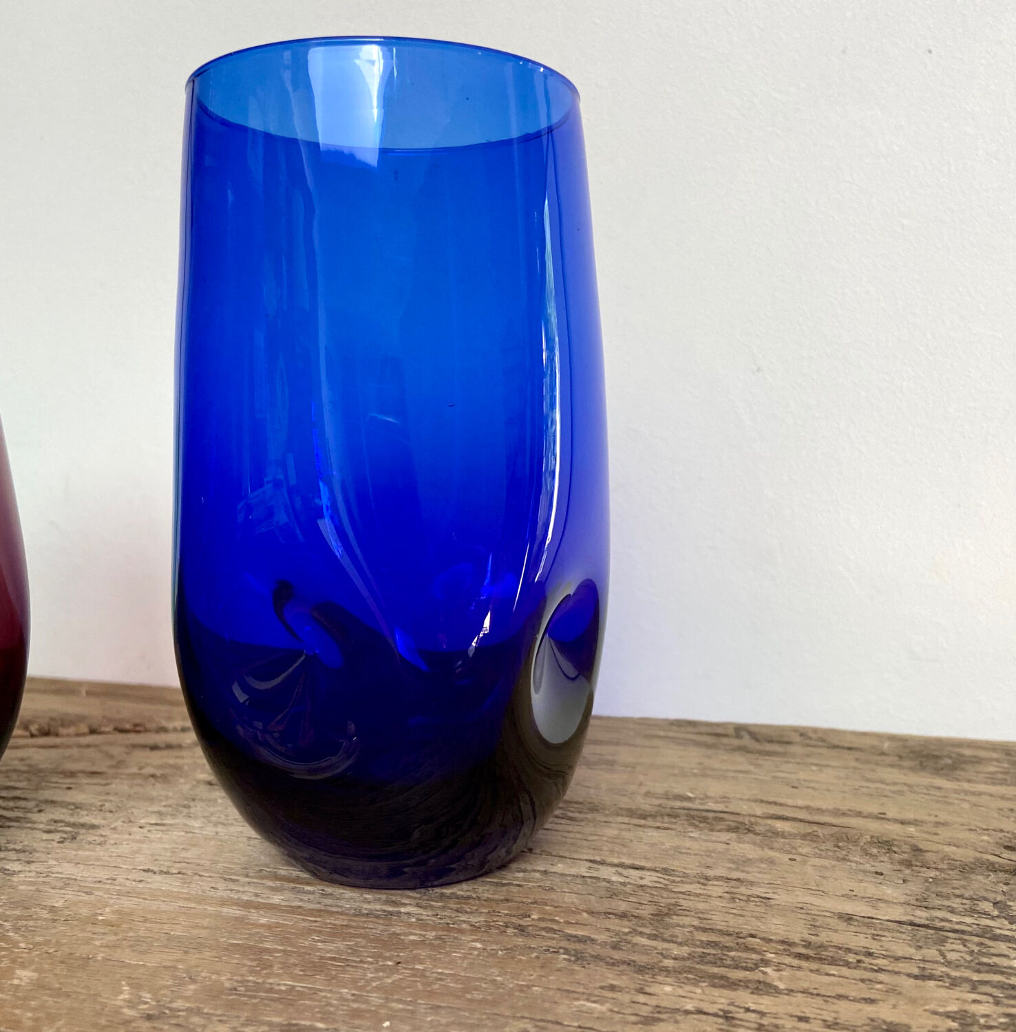 3 blue colored long drink glasses