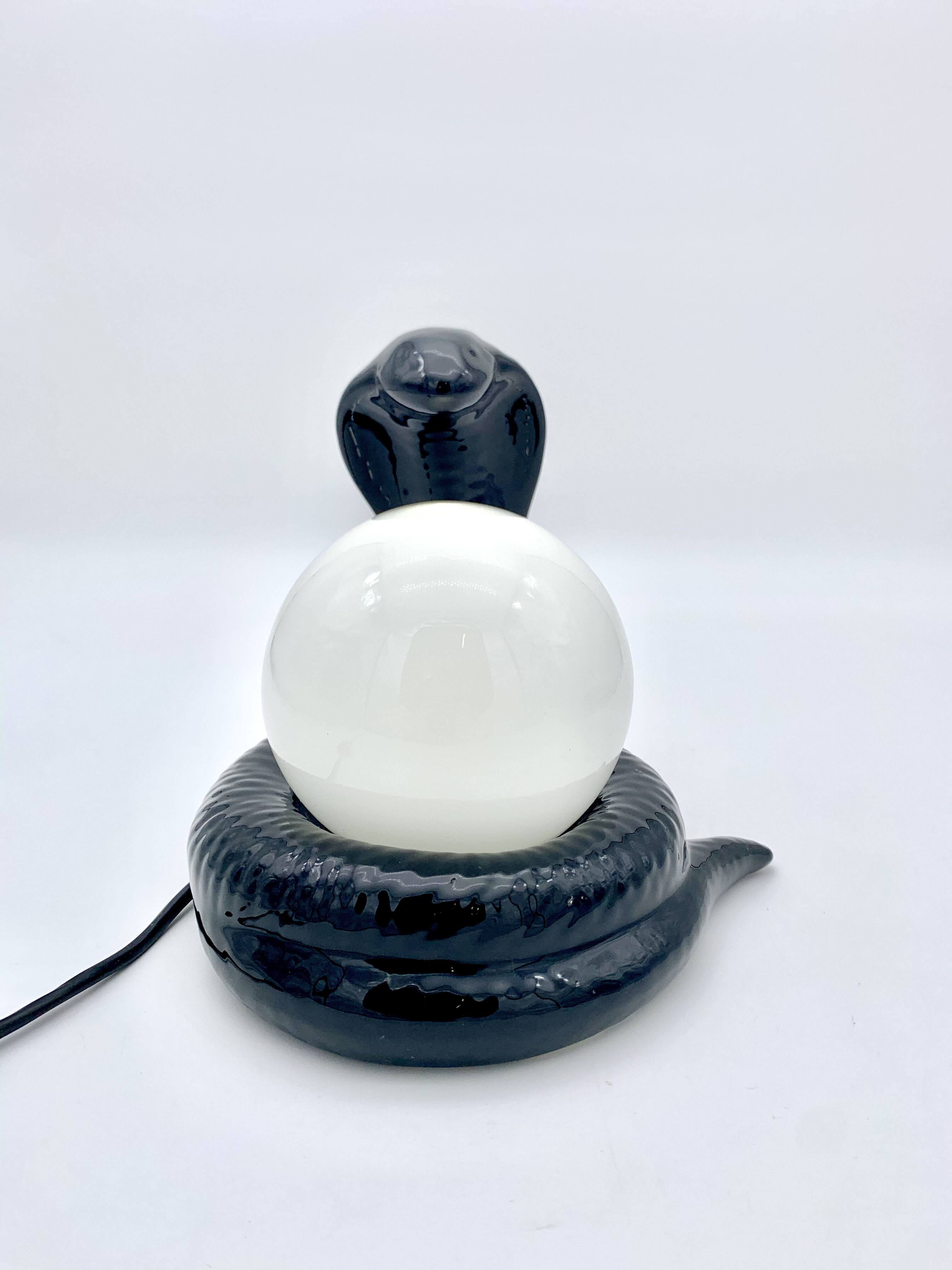 Black ceramic cobra lamp