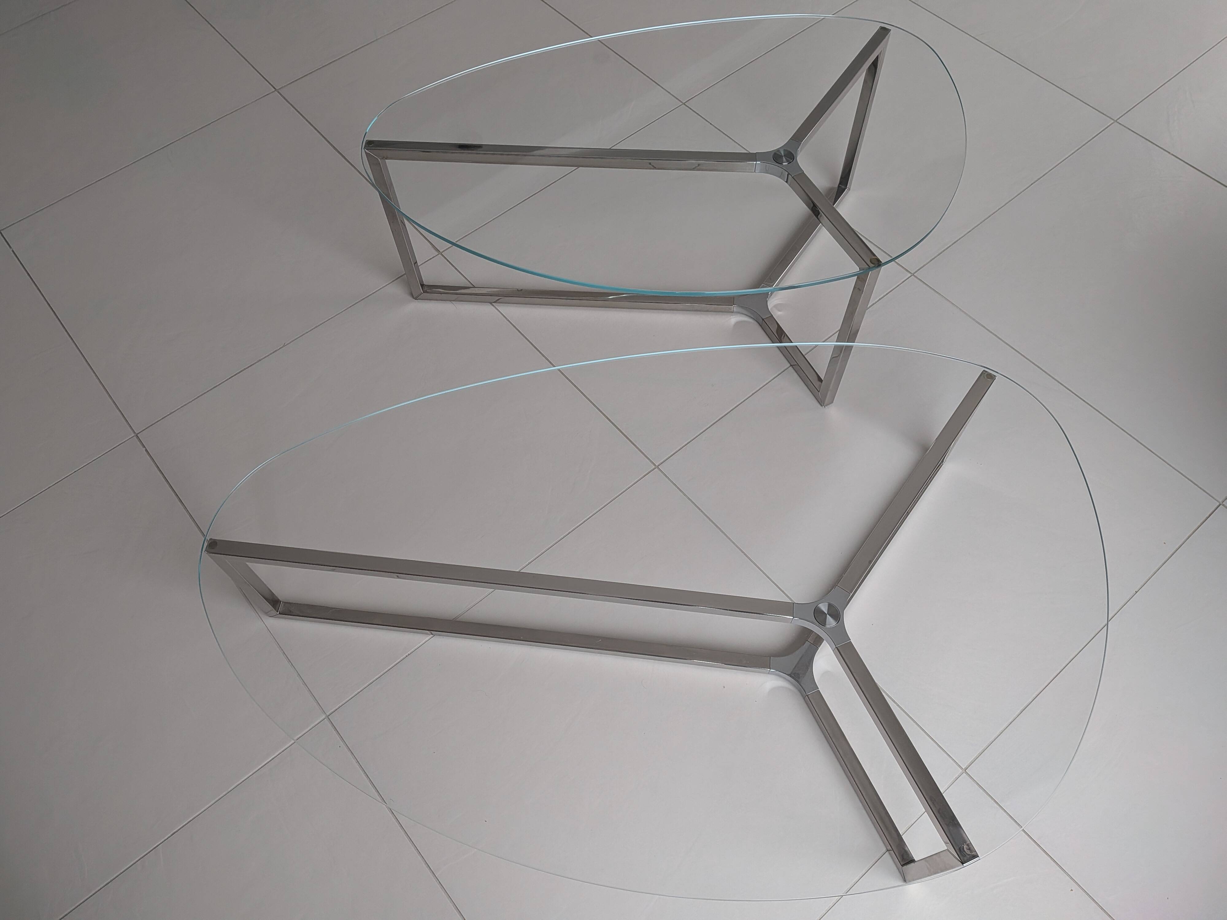 2 oval glass and chrome coffee tables, nesting, stackable, "gal" shape.