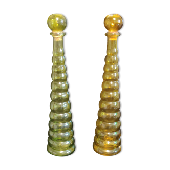 yellow and green colored glass decanters