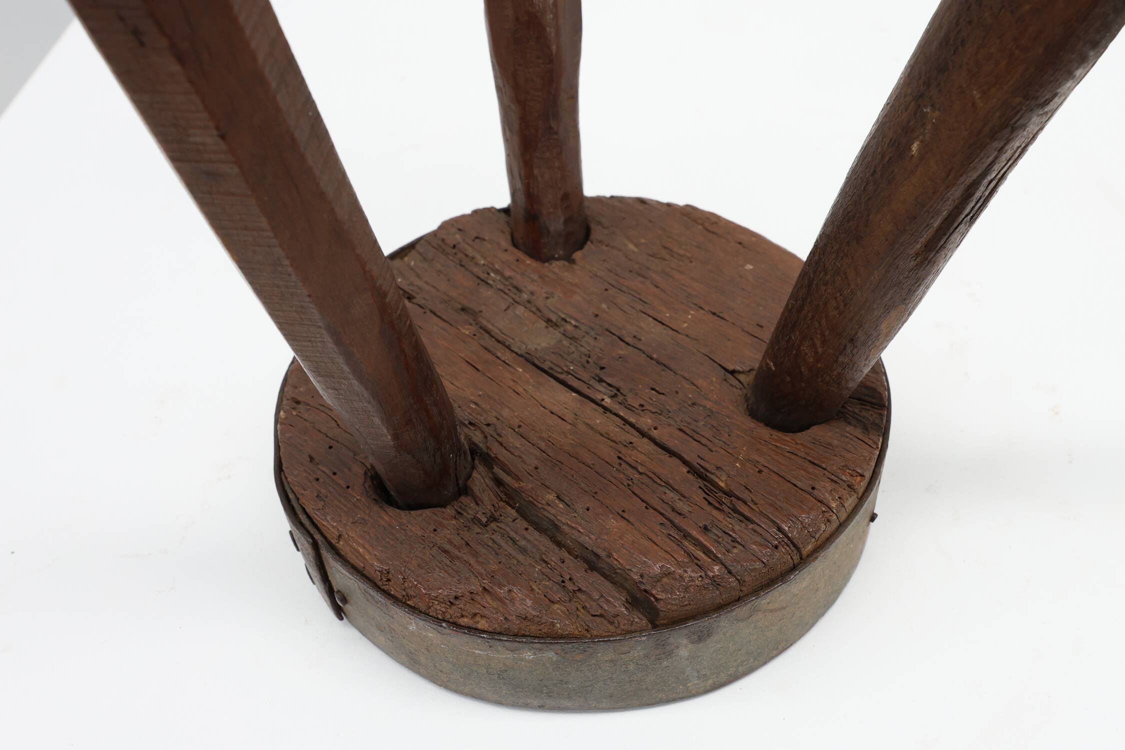 Brutalist French solid oak tripod stool with metal rim, 1850s