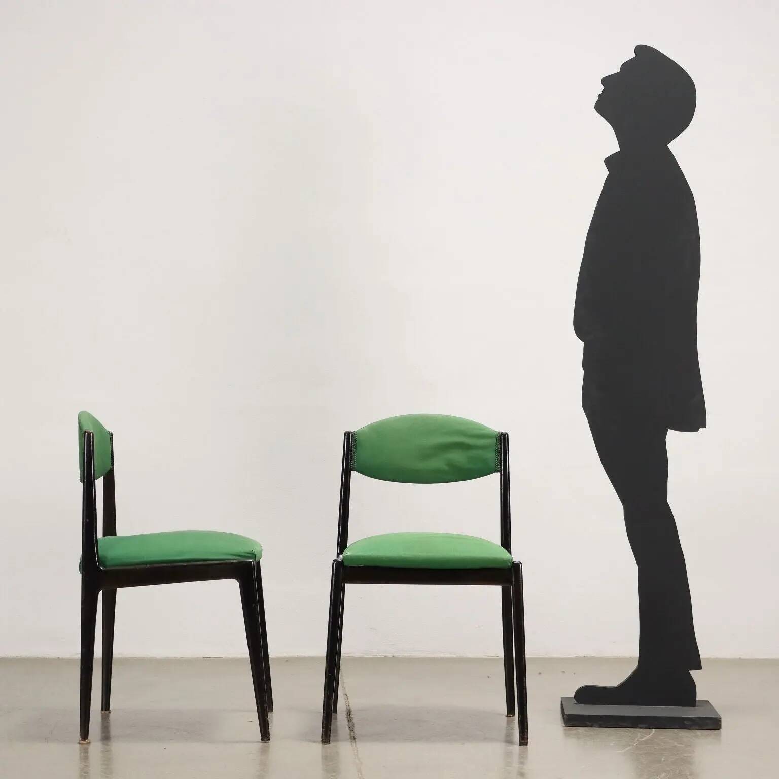 Vintage 1960s ebony wood chairs, foam padding, fabric.