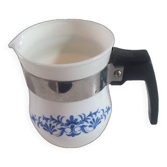 white ceramic milk jug with blue flowers, metal handle