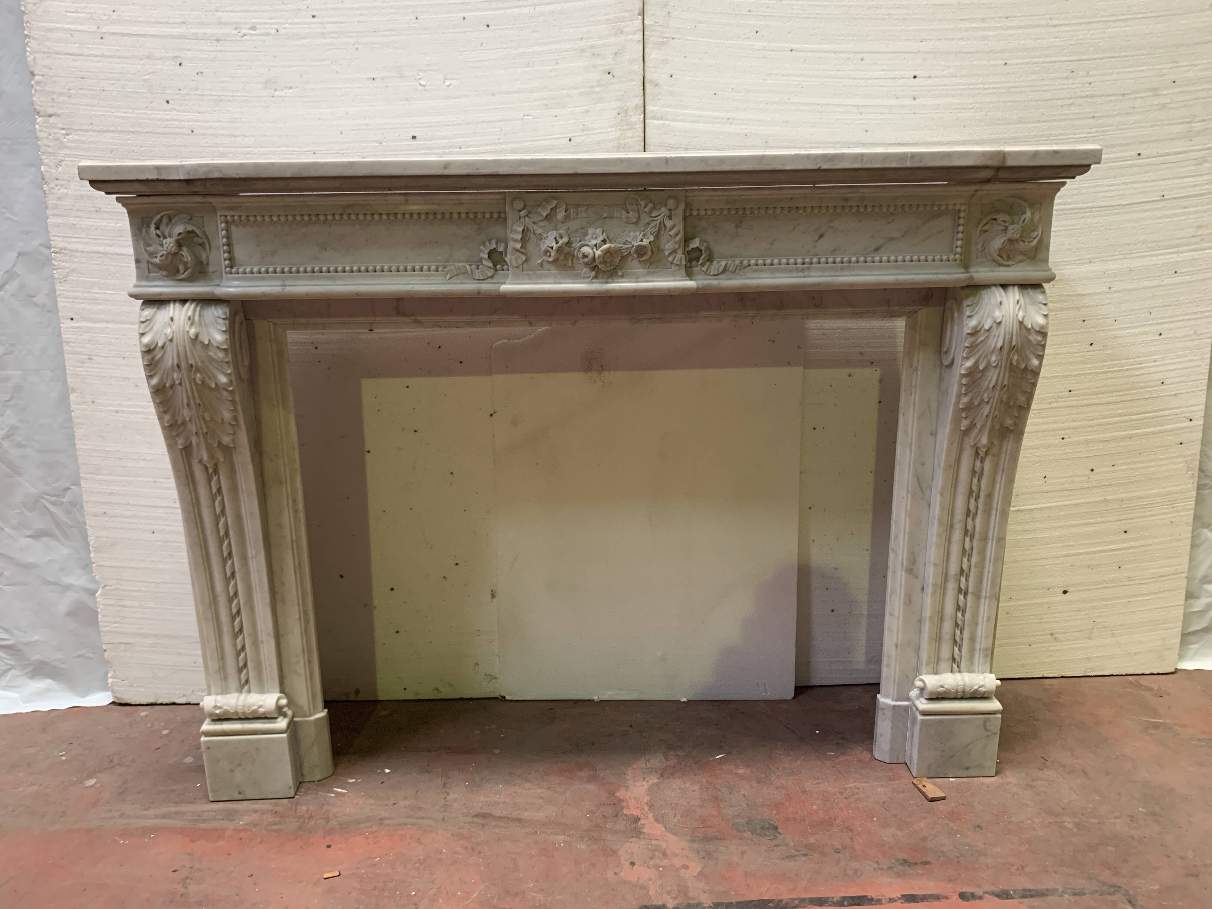 Louis XVI style fireplace in white Carrara marble, 19th century