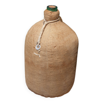 Bouteille dame Jeanne, bouteille verre vert habillée de toile de jute, bonbonne