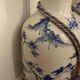 Set of two very large white and blue ceramic vases.