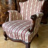 Louis Philippe style armchair with footrest from the 19th century.