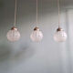 Pair of Art Deco frosted glass pendants, 1920s-30s.