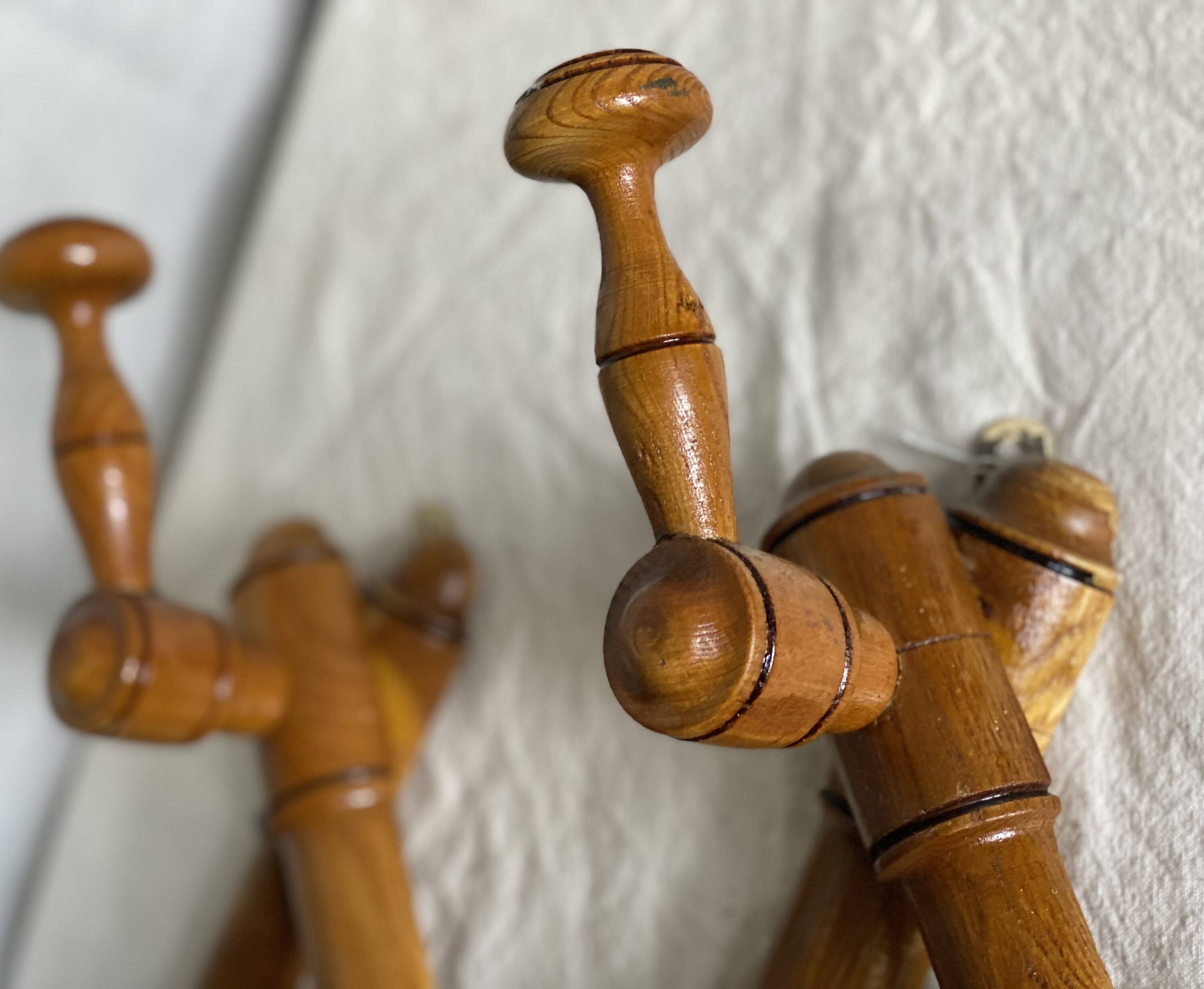 19th century turned wood accordion coat rack.