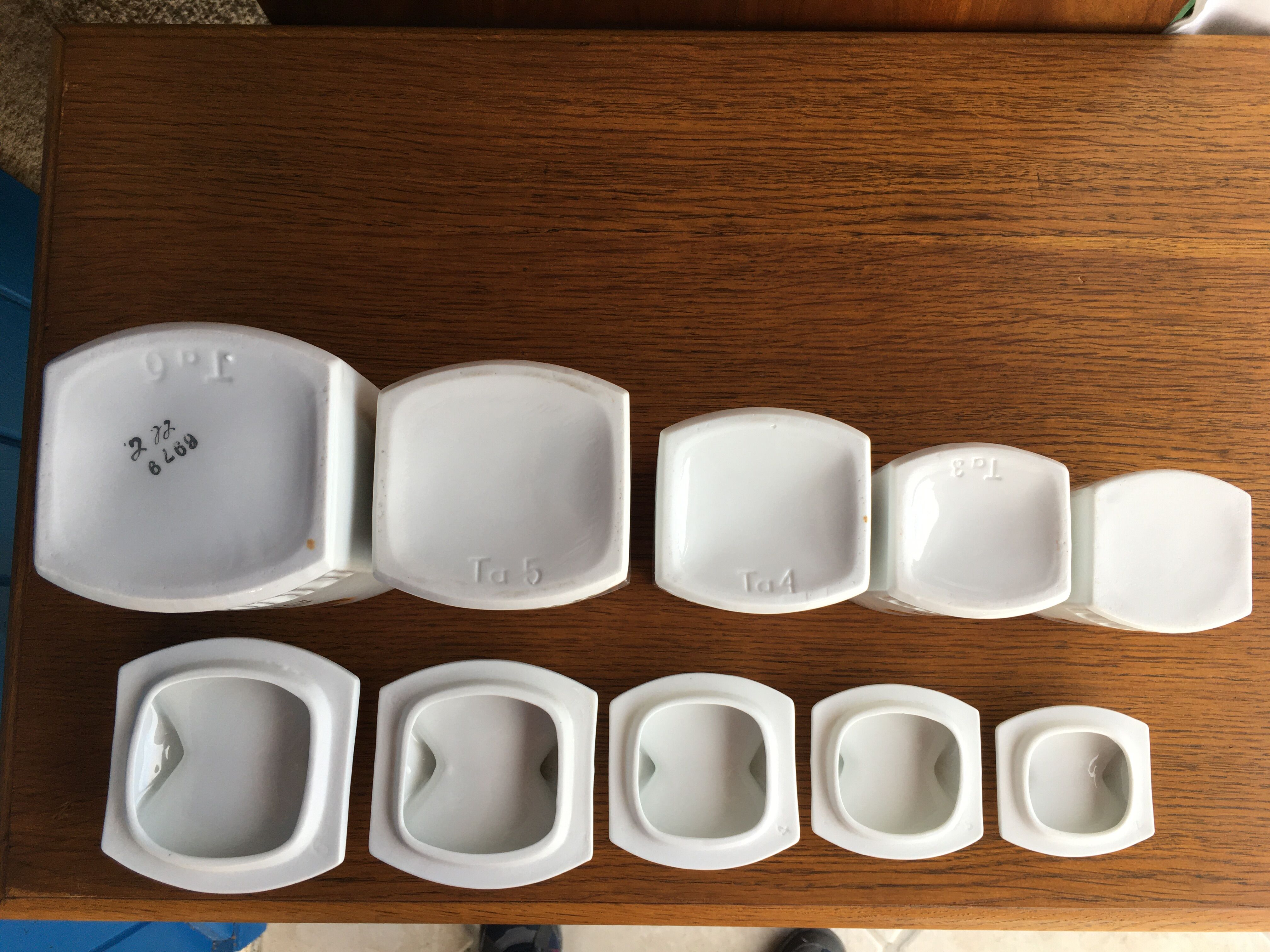 Suite of 5 old porcelain spice pots
