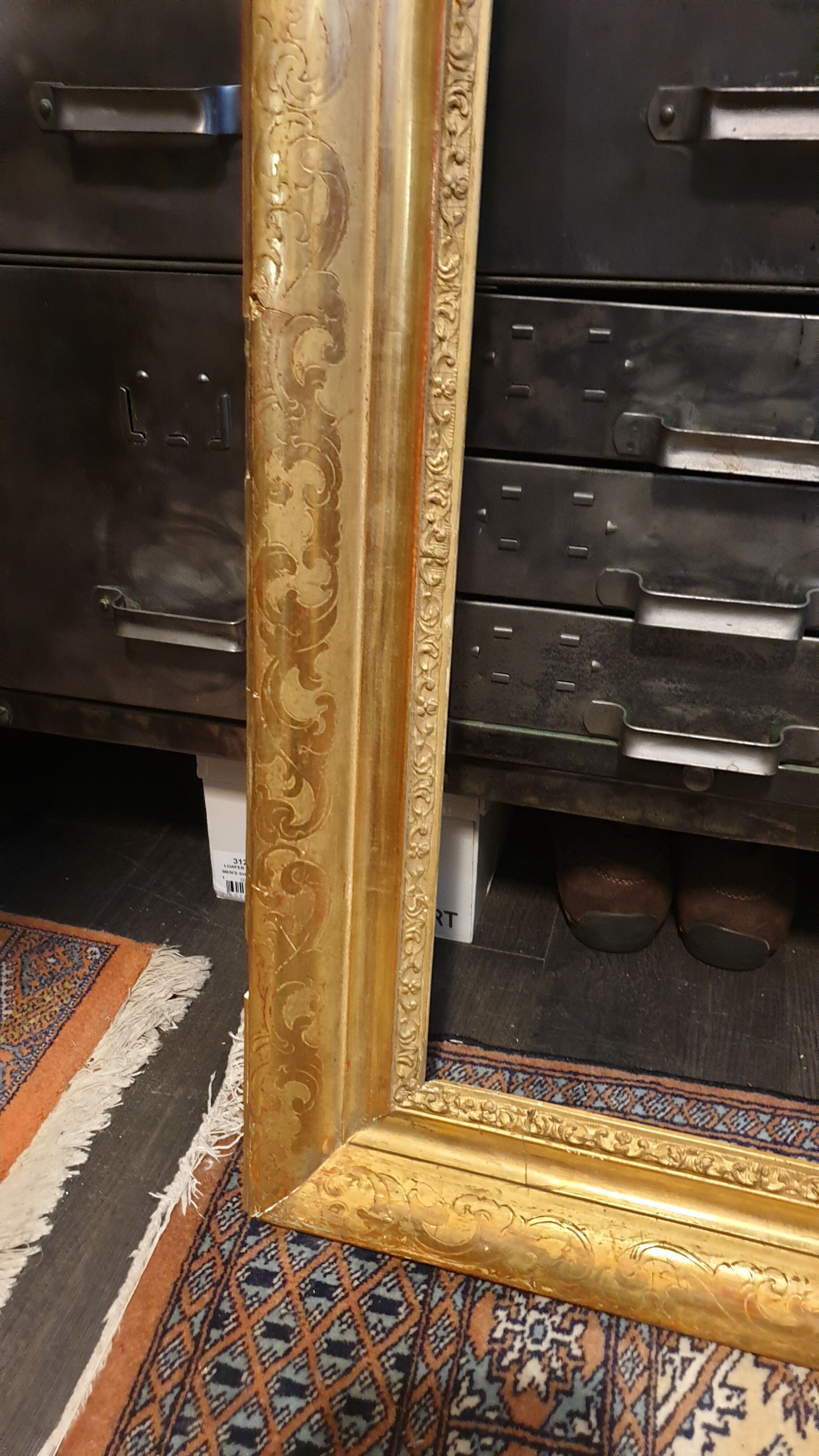 Nineteenth wood frame and gilded stucco