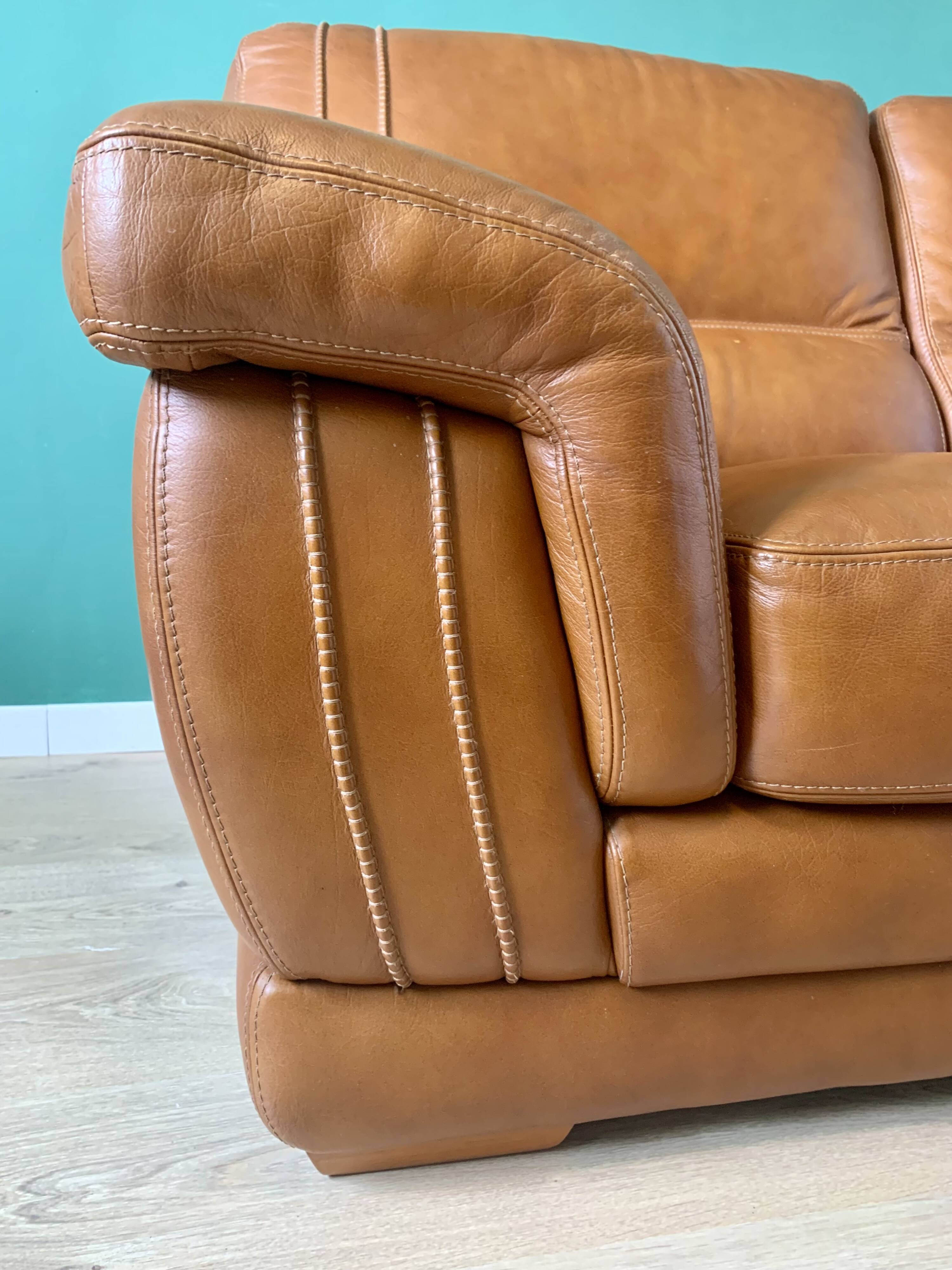 Two-seater leather sofa