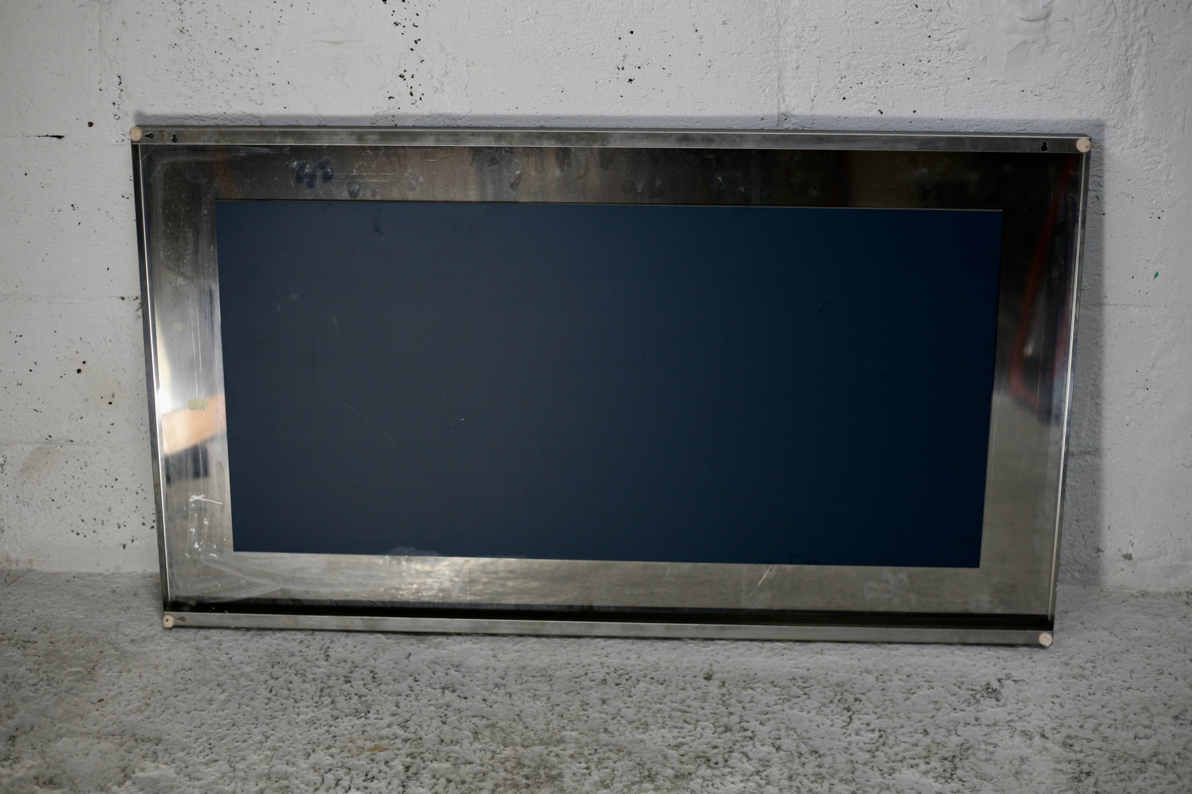 Large steel mirror from the 70s