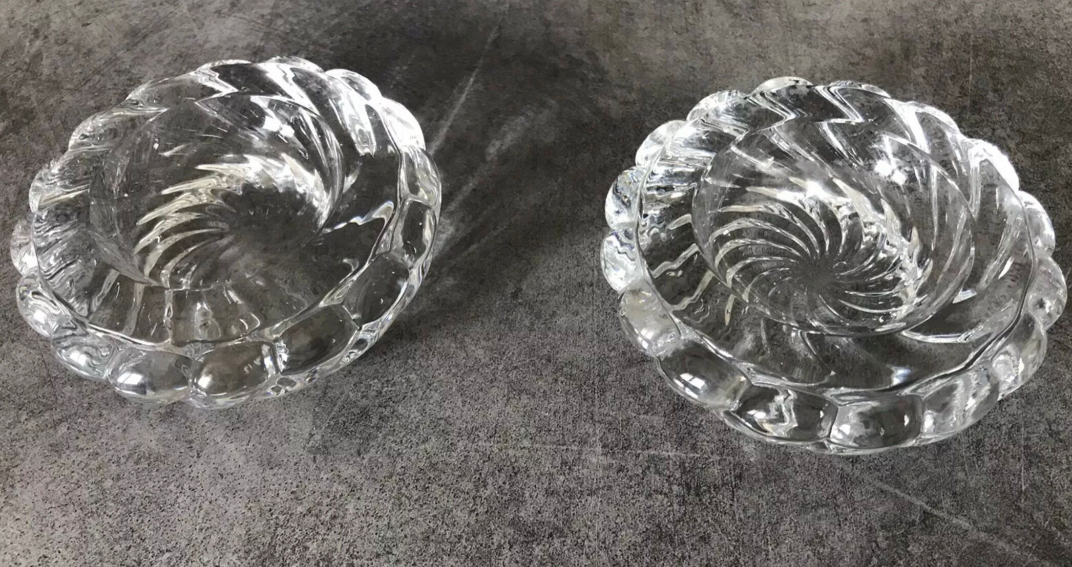 Pair of twisted round candlesticks in baccarat crystal stamped