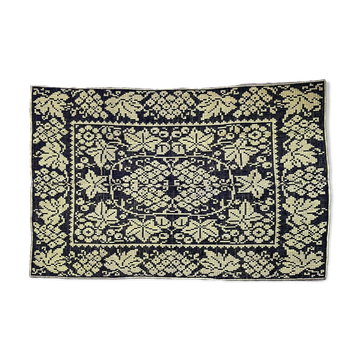 Romanian floral rug handwoven in wool, yellow and black background