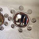 Pair of wrought iron sun mirrors