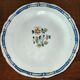Old earthenware plate of the North XVIIIth Century with floral decoration