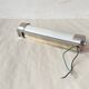 Opaline tube and chrome-plated brass wall lamp