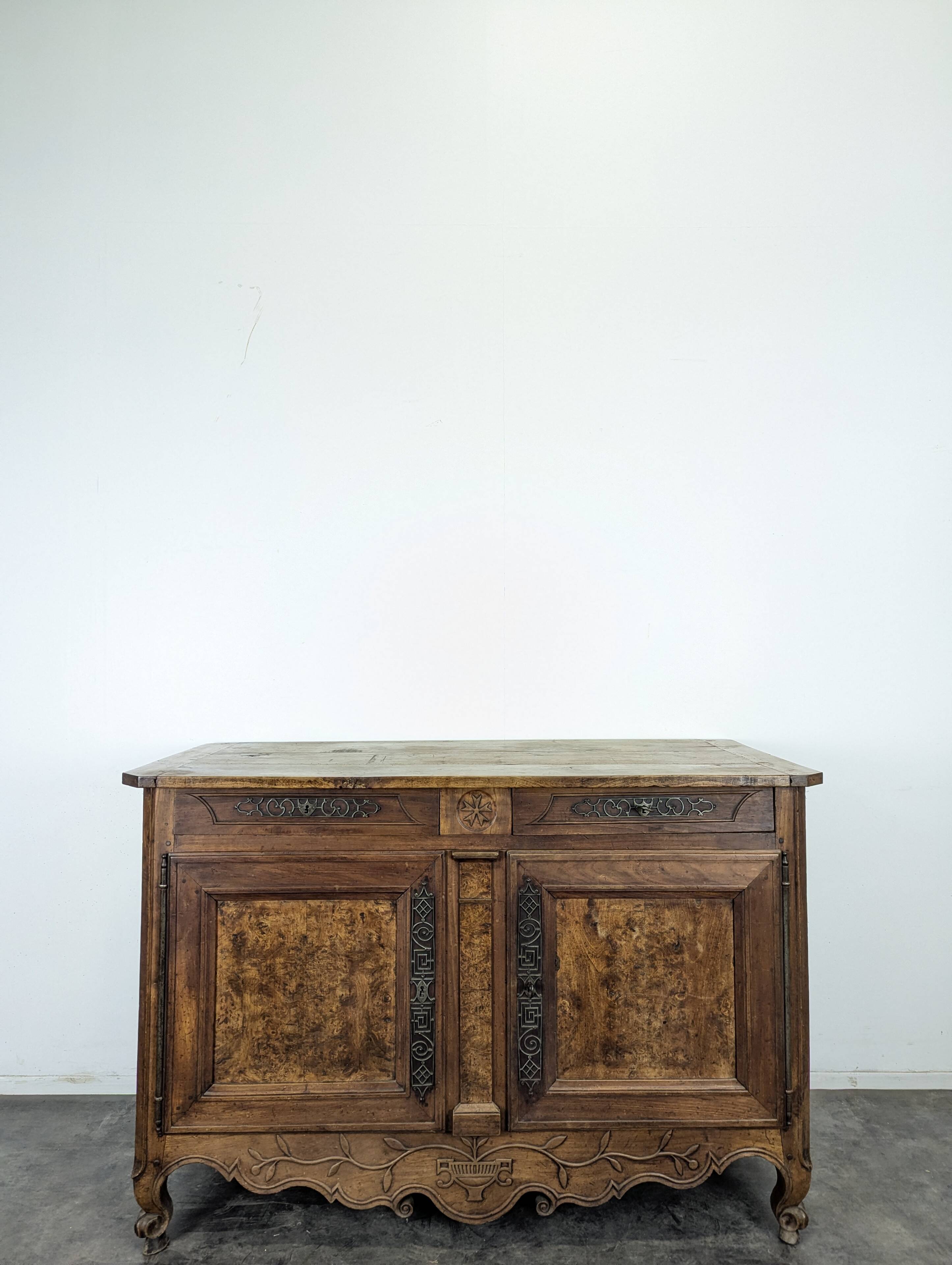 Louis XV-style buffet in walnut and burl with openwork fittings.