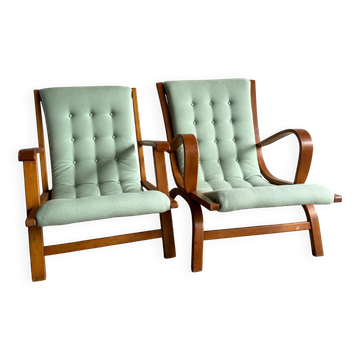 Ensemble de 2 fauteuils vintage en velours vert menthe avec cadres en bois miel.