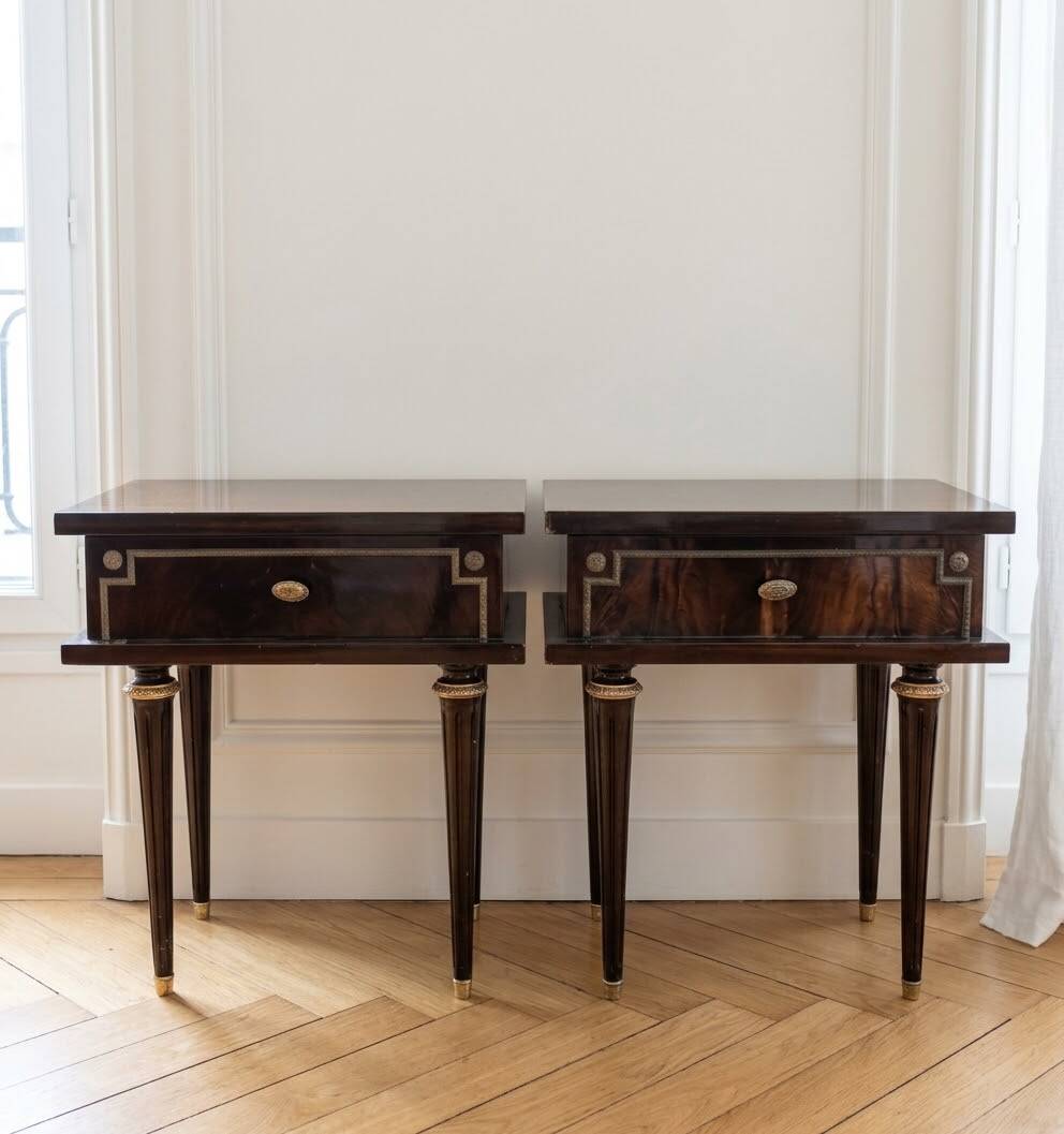 Pair of Louis XVI style bedside tables in dark wood.