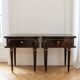 Pair of Louis XVI style bedside tables in dark wood.