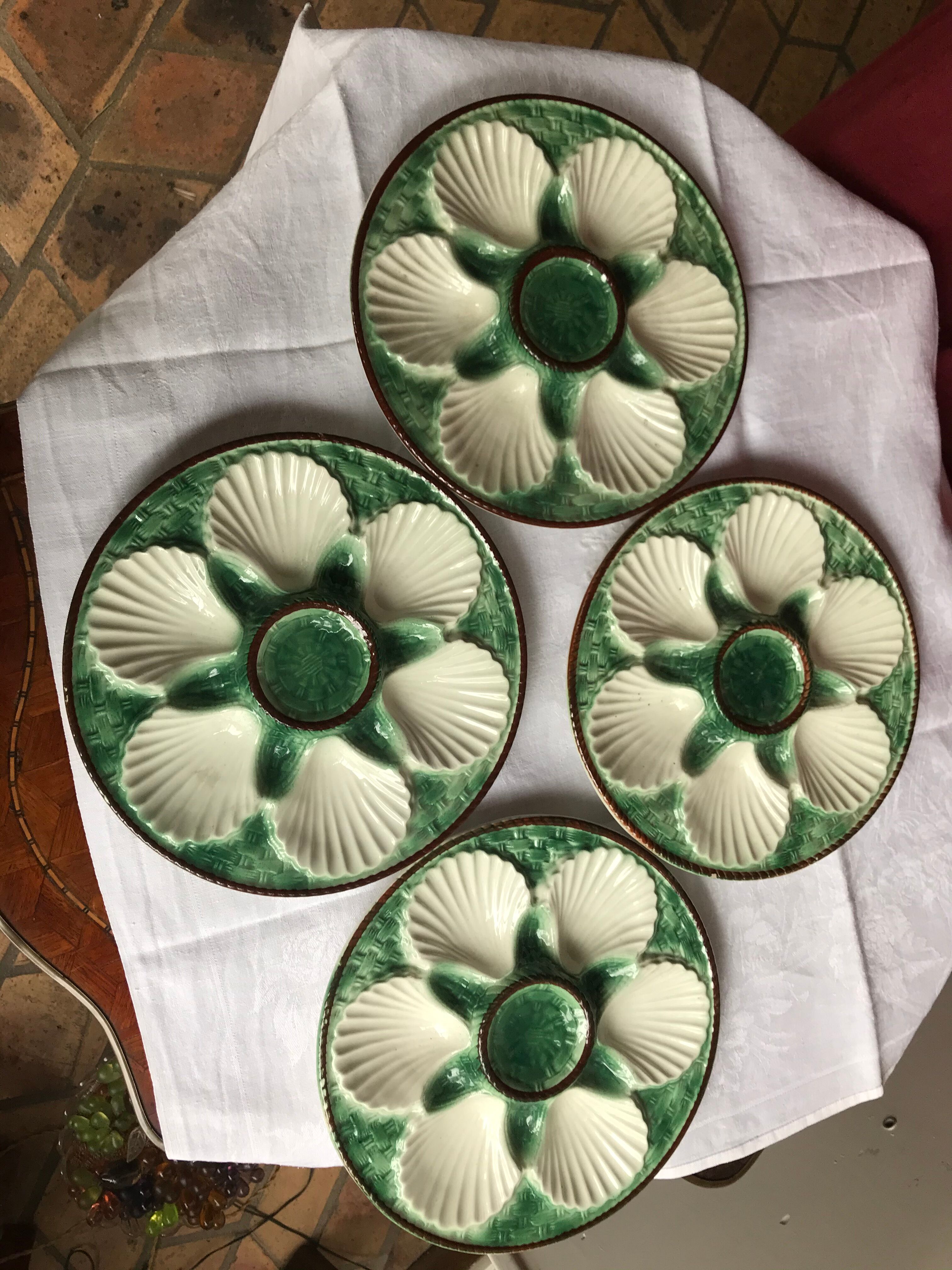 4 vintage oyster plates