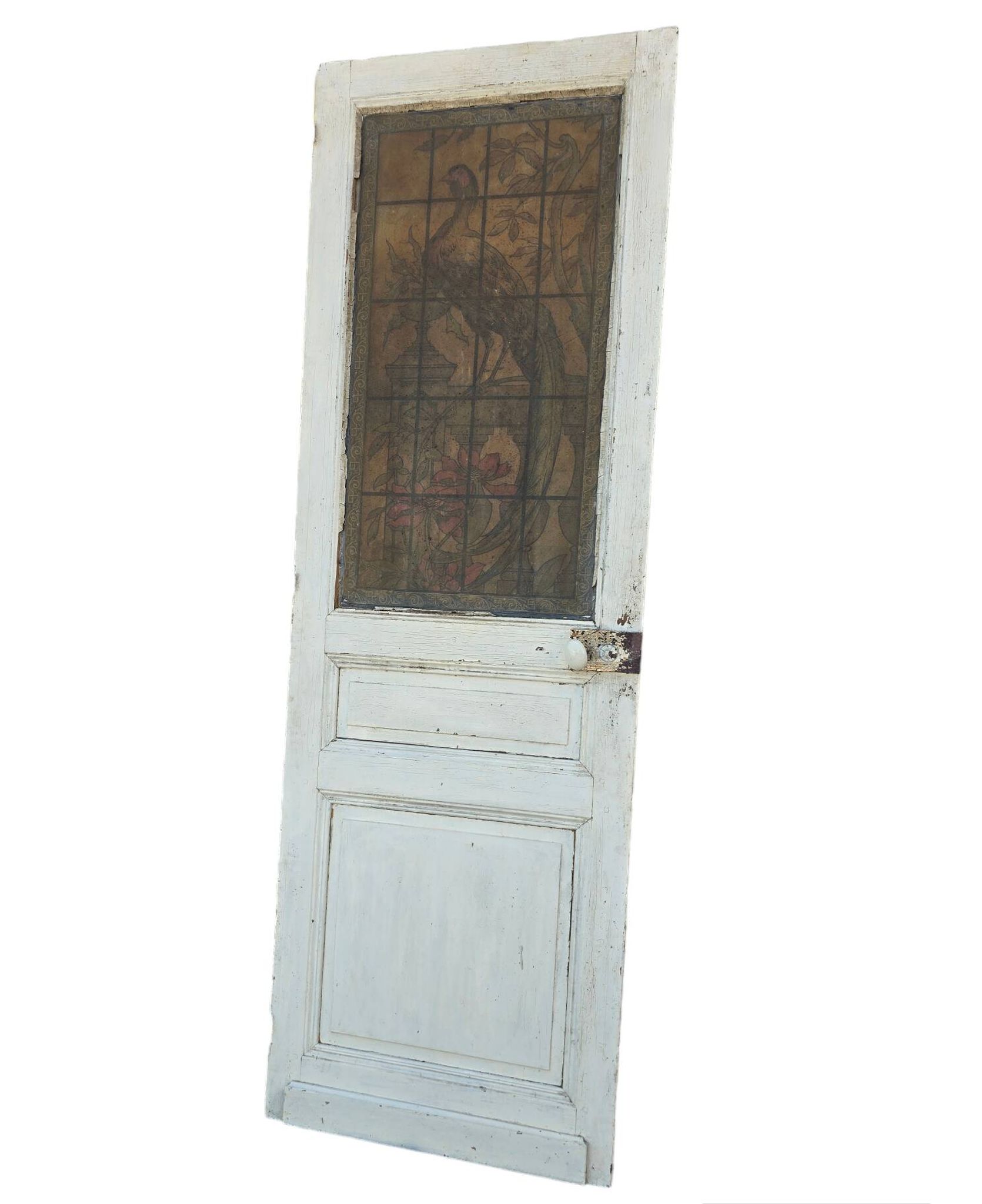 old door with decorated window