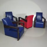 4 x Vintage Ying lounge chairs / fauteuils van Hugues Chevalier,'90. 3 x blue / 1 x red leather