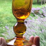 Champagne flutes bubbled amber blown