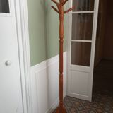 Wooden coat rack on stand