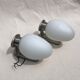 Pair of brushed steel appliques, half-egg opaline, 1970