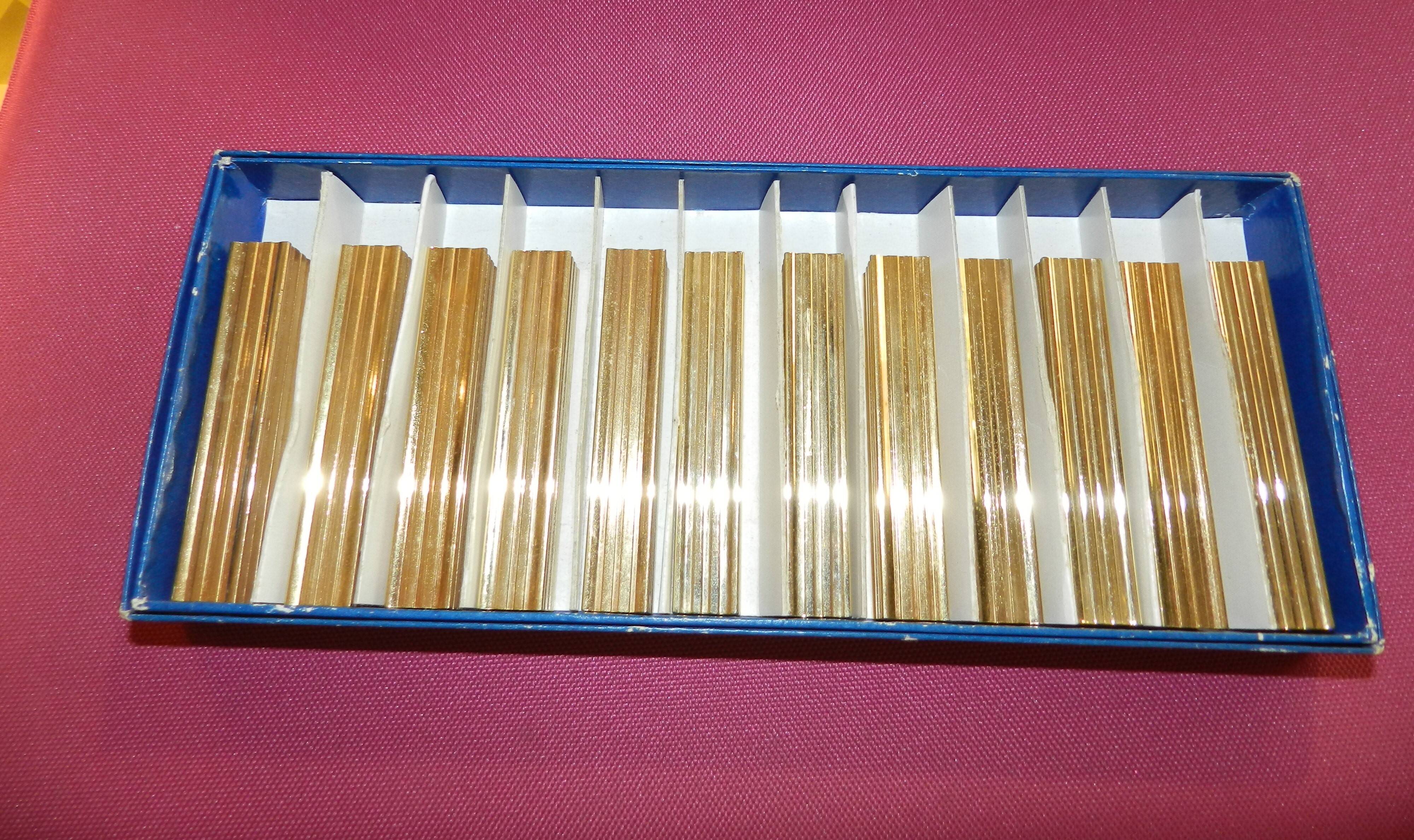 Lot de 12 porte-couteaux dorés