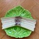 Green slipware asparagus dish